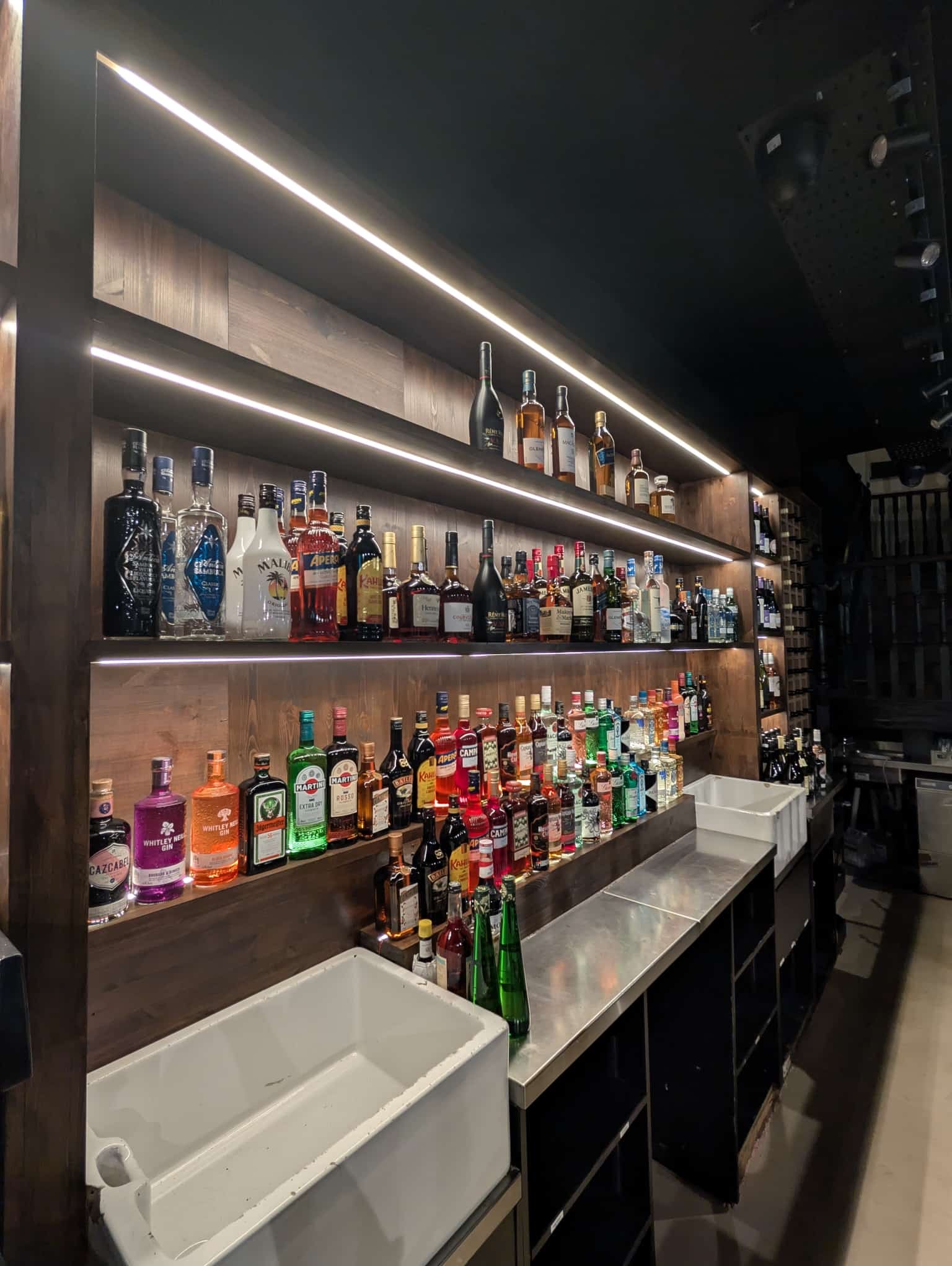 Bar interior with LED strip lighting installation